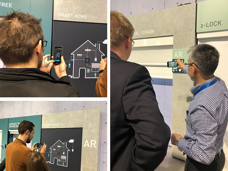 Image of People interacting with AR markers at trade fair